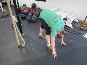 Monica using some hip distraction for a great hamstring stretch!